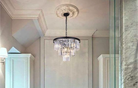 modern chandelier over bathtub